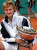 Juan Carlos Ferrero feliz con su trofeo