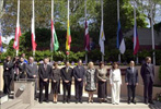 Los embajadores en Espaa de los diez nuevos pases miembros que maana se incorporarn a la Unin Europea, durante el acto de izada de banderas celebrado en Madrid.