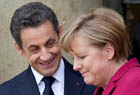 Sarkozy y Merkel, en la cumbre de Pars, 19 de marzo 2011.
