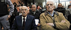 Los ex dictactores Videla y Bignone mientras escuchaban la sentencia.
