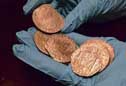 Algunas de las monedas de oro rescatadas de "La Mercedes"