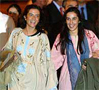 Simona Pari (i) y Simona Torretta, a su llegada al aeropuerto militar de 