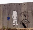 Pintadas de protesta en el muro que ha levantado Israel