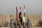 La bandera de EEUU y la de Irak, en la ceremonia de despedida de EEUU en Irak