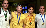 Reyes Estves, medalla de plata en los 1.500 m, Paquillo Fernndez y Jos Manuel Molina, oro y bronce en los 20 km marcha, y Jos Manuel Martnes, oro en los 10.000 metros, a su llegada a Madrid 