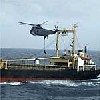 Un helicptero de la Armada espaola sobrevuela el buque "So San", detenido en una operacin llevada a cabo por la fragata "Navarra" y el buque "Patio" de la Armada espaola 