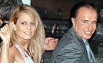 Carlos Menem, junto a su esposa, Cecilia Bolocco celebran la puesta en libertad del ex presidente argentino despus de 166 das de arresto domiciliario.