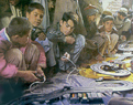 Unos nios juegan al scalextric en un mercado de Kabul.